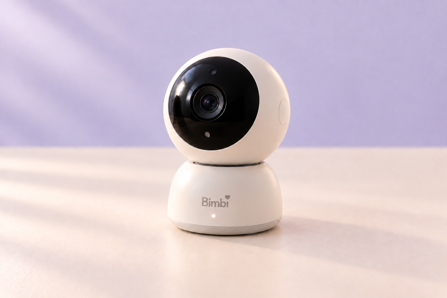 Rounded cream Bimbi Camera concept with a black camera lens and a compact base.
